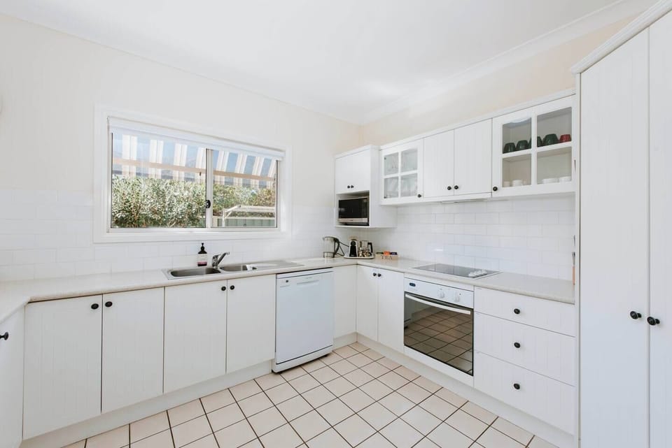 A fully equipped kitchen allows you to easily whip up meals at home for the group.
