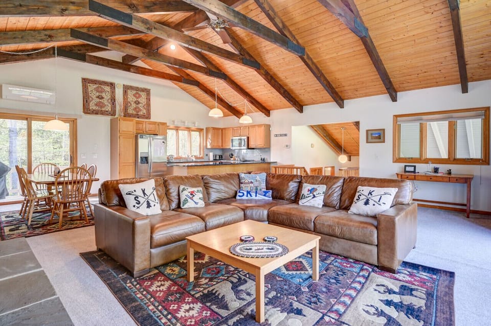 Spacious open floor den area where families can sit back and relax with a nice fire.