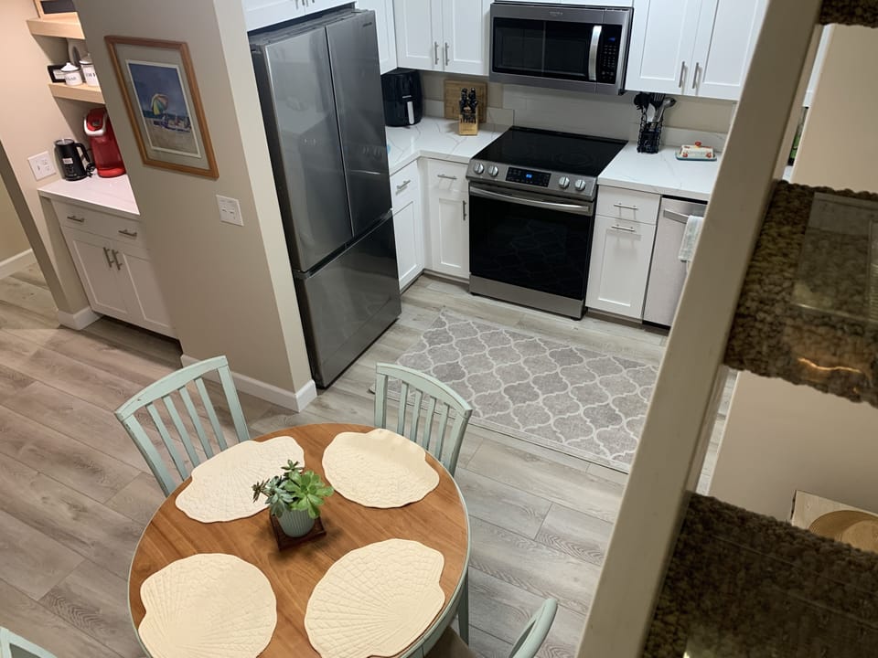 Kitchen with new appliances both large and small