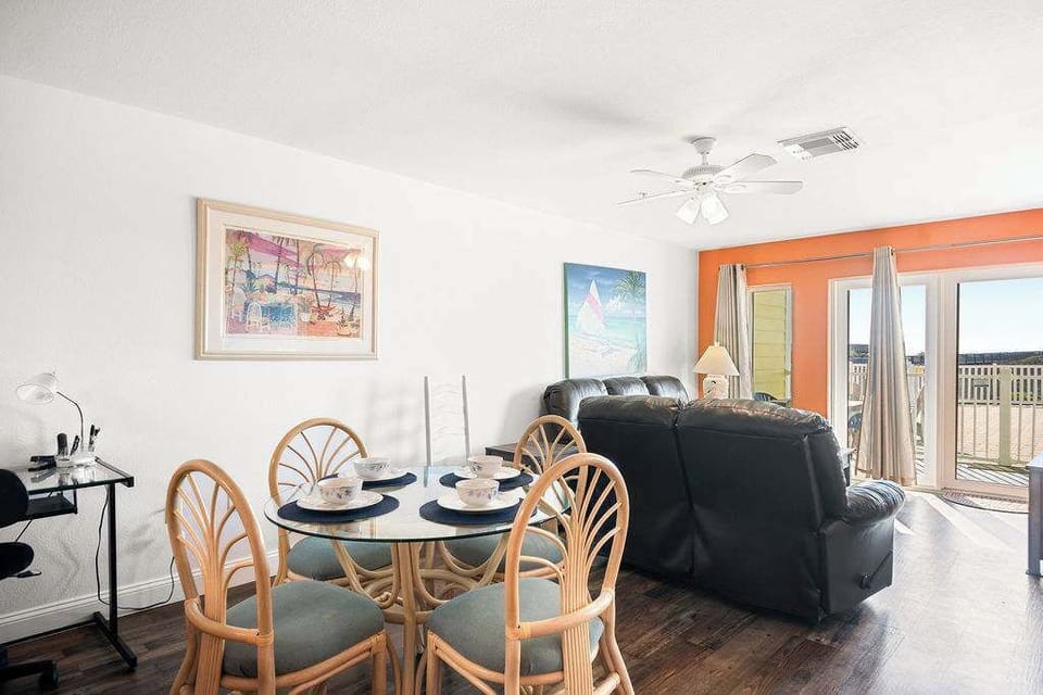 Just steps from the living room, the dining area for 4 provides a charming space for meals and quality time with loved ones."