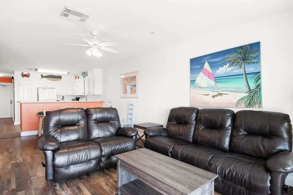 Relax in style on the large leathered sofa in the living room