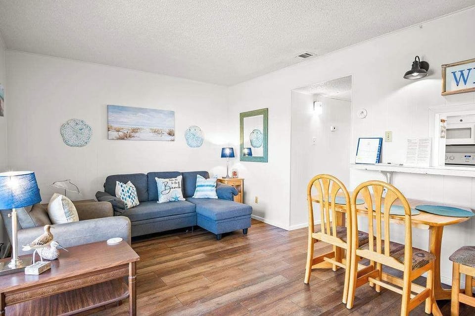 Stretch out, snuggle up, and stay awhile. This living room was designed for one thing: total relaxation (with a side of fun).