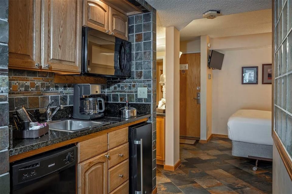 Fully-equipped kitchen with modern appliances.