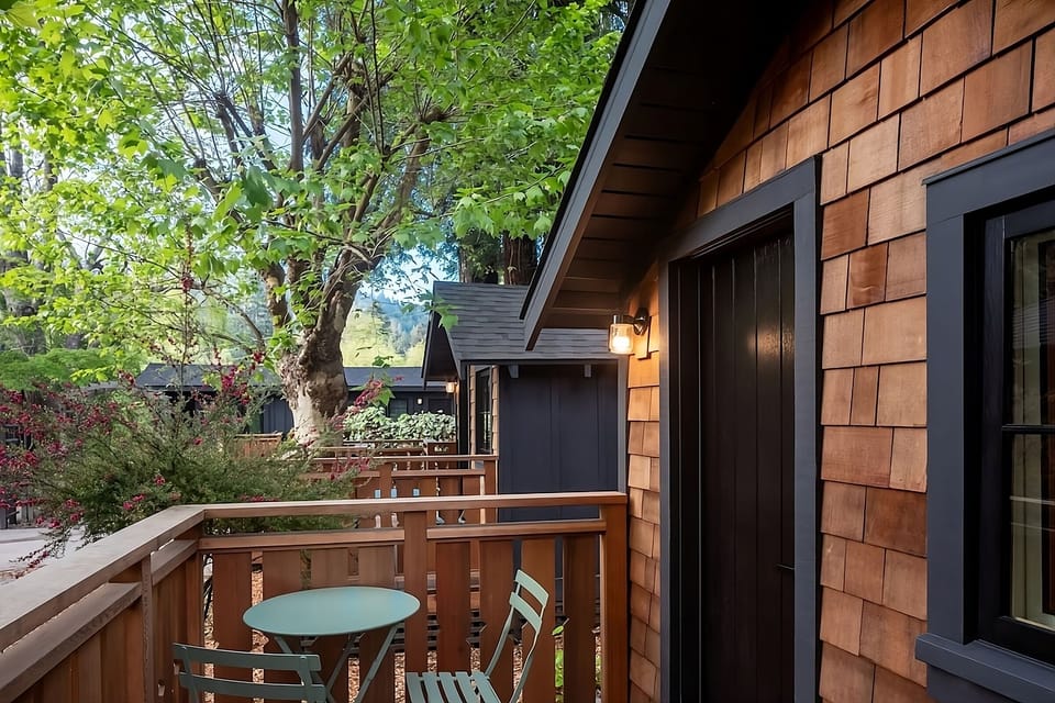 Step outside to your private deck among the trees