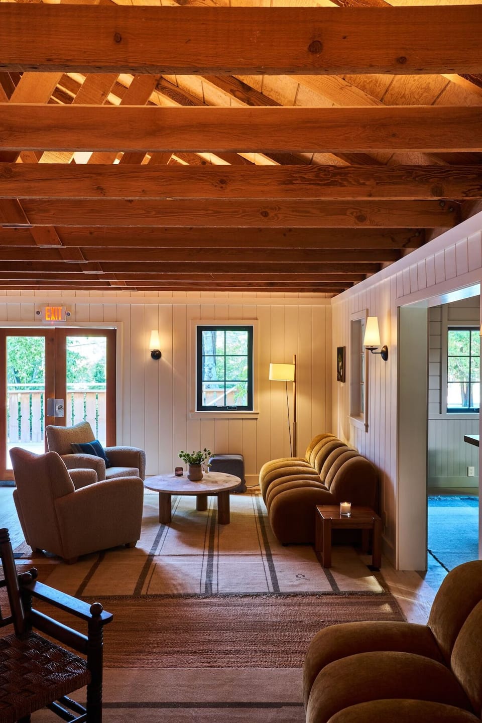 Relax on comfy sofas in a softly lit lounge retreat.