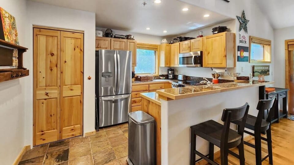 The fully equipped kitchen is set up with everything you need to prepare delicious meals during your stay.