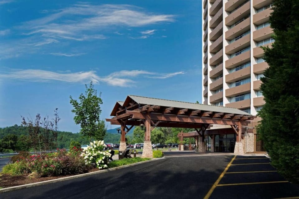Arrive easily under a welcoming covered entrance and gardens.