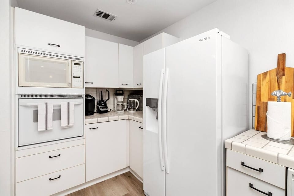 Oven, microwave, and coffee galore
