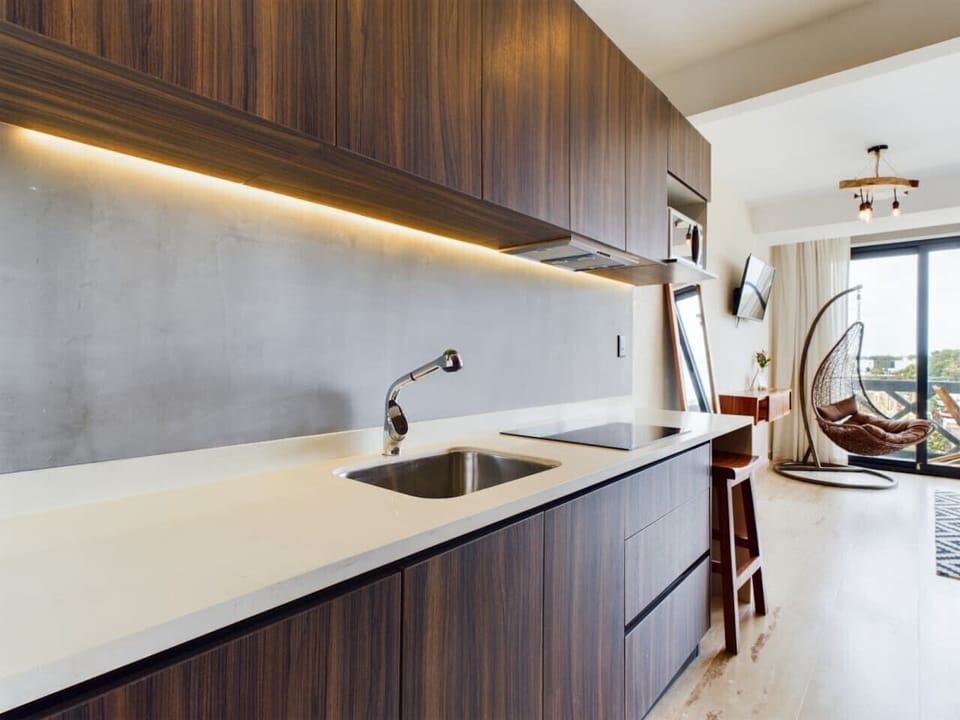 `Cook in style: contemporary kitchen w/ streamlined minimalist charm.