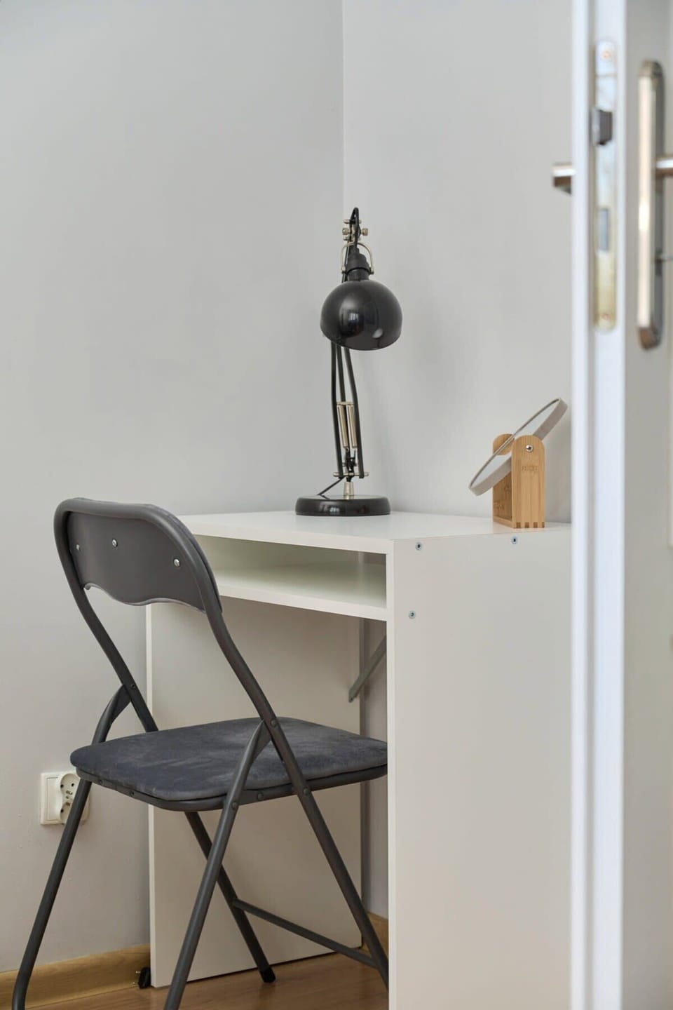 A perfect desk for work, located in the corner of the living room.
