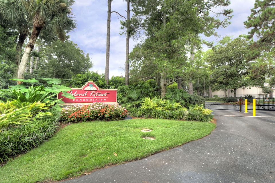 Island Retreat Gated Entrance - Landscaped entrance for Island Retreat, just off Demere Road near restaurants and island routes.