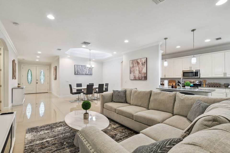Plenty of comfy seating is available on the sofa in the main living area, making this the perfect place to spend time with the whole family. 