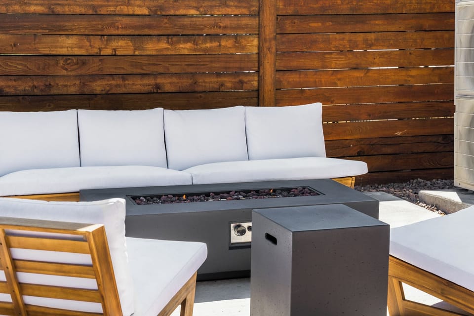 7person hot tub, fire table, lounge sofas, outdoor dining table, grill &cornhole