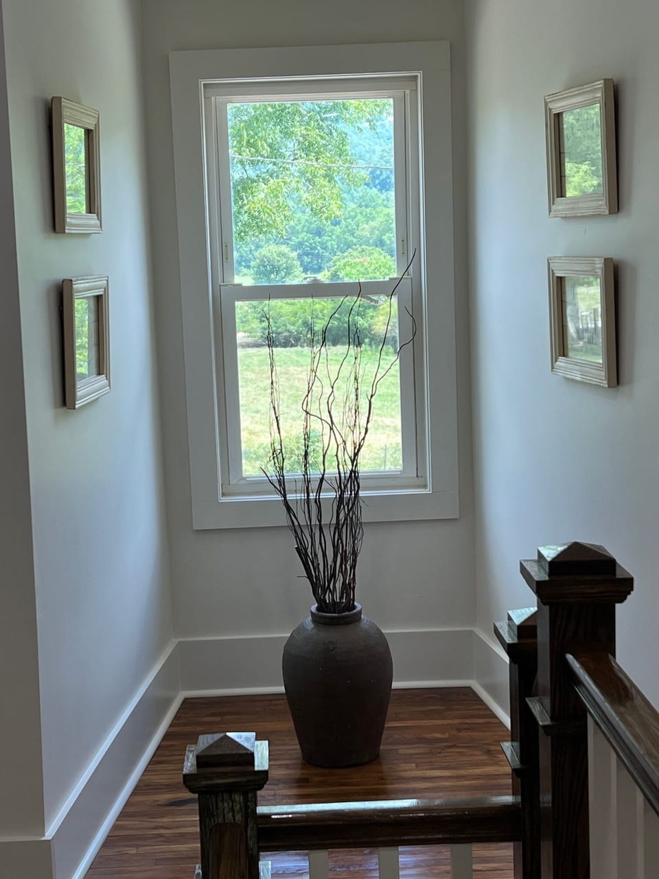Top of stairs with view of pasture