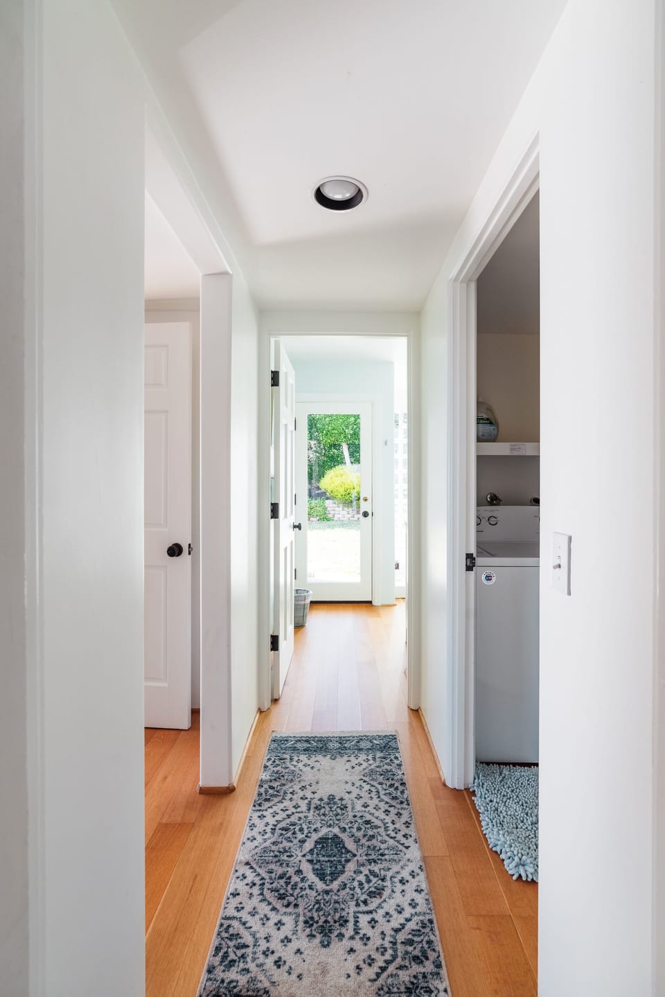 Hallway leading to bathroom