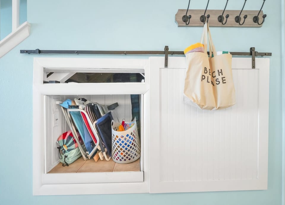 Cubby with pool and beach gear (chairs, toys, towels)