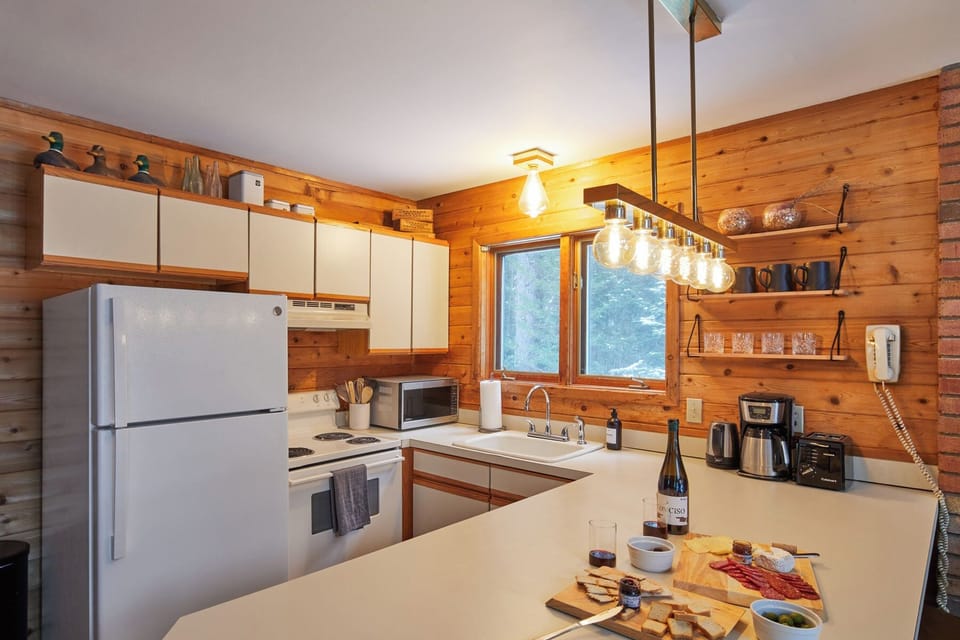 We kept the 80's alive in this full-size kitchen equipped w/ everything you need