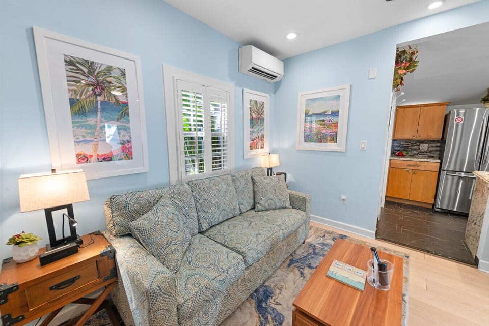 Dining table can be raised to become a cozy dining area to watch TV.
