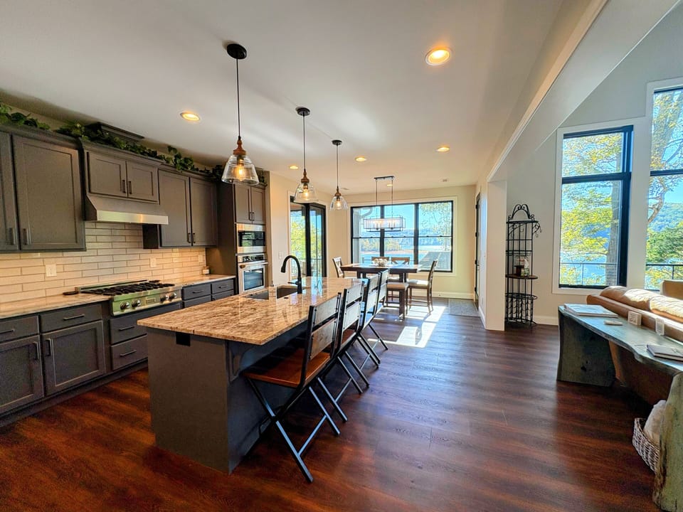Well stocked kitchen, extendable dining table and what a view!
