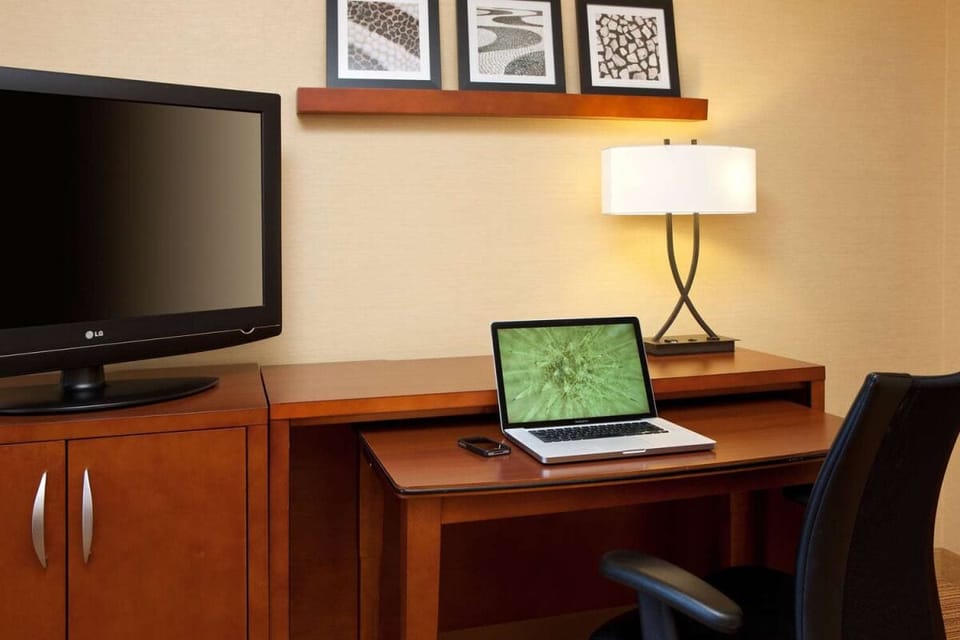 Get work done comfortably at your dedicated in-room desk.