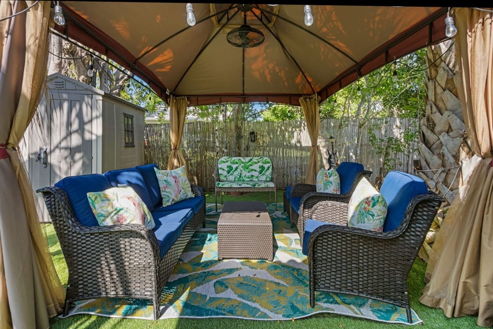 Enjoy the outside in a new gazebo with plenty of seating.