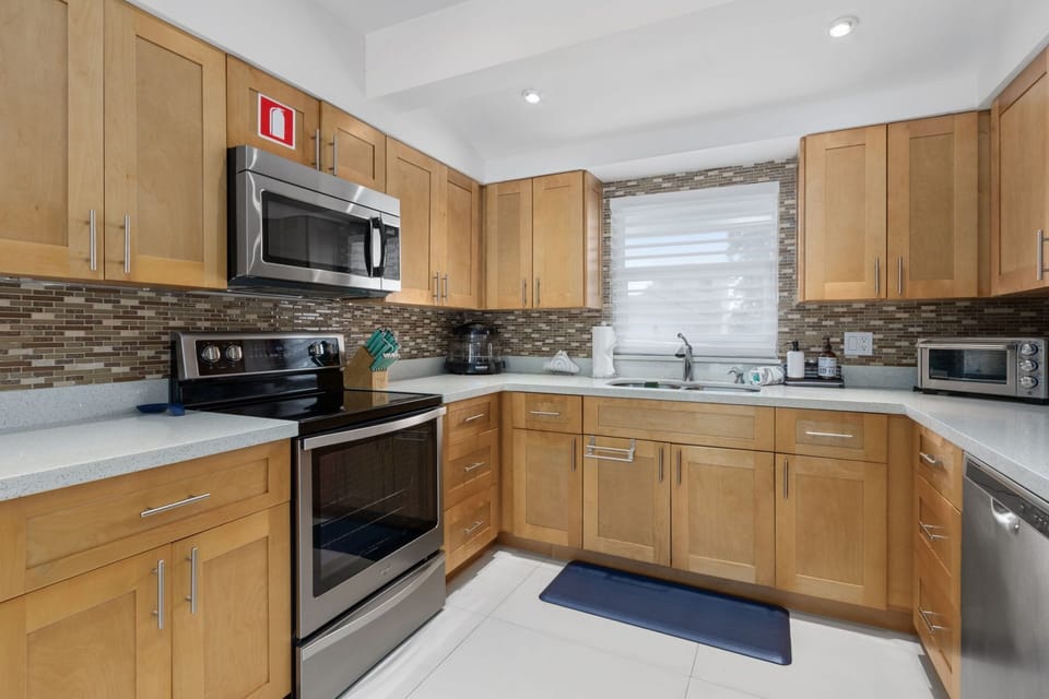 Cook a nice meal in this kitchen with just about every accessory you need.