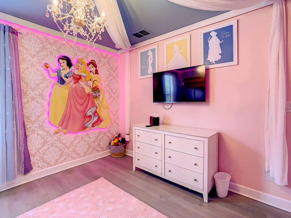 Make royal dreams come true in this enchanting princess-themed room with 3 magical bunk beds—fit for little queens!