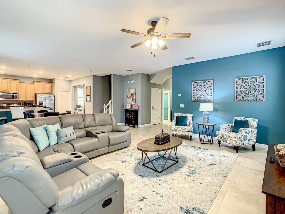 Unwind in this cozy, sunlit living space designed for comfort and connection.