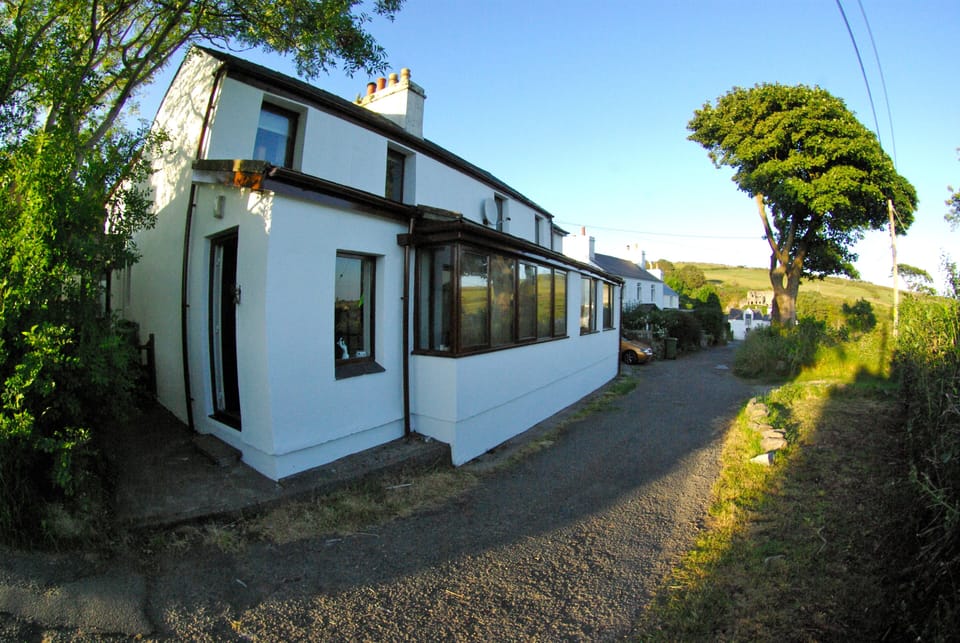 Front of the house, with parking opposite.