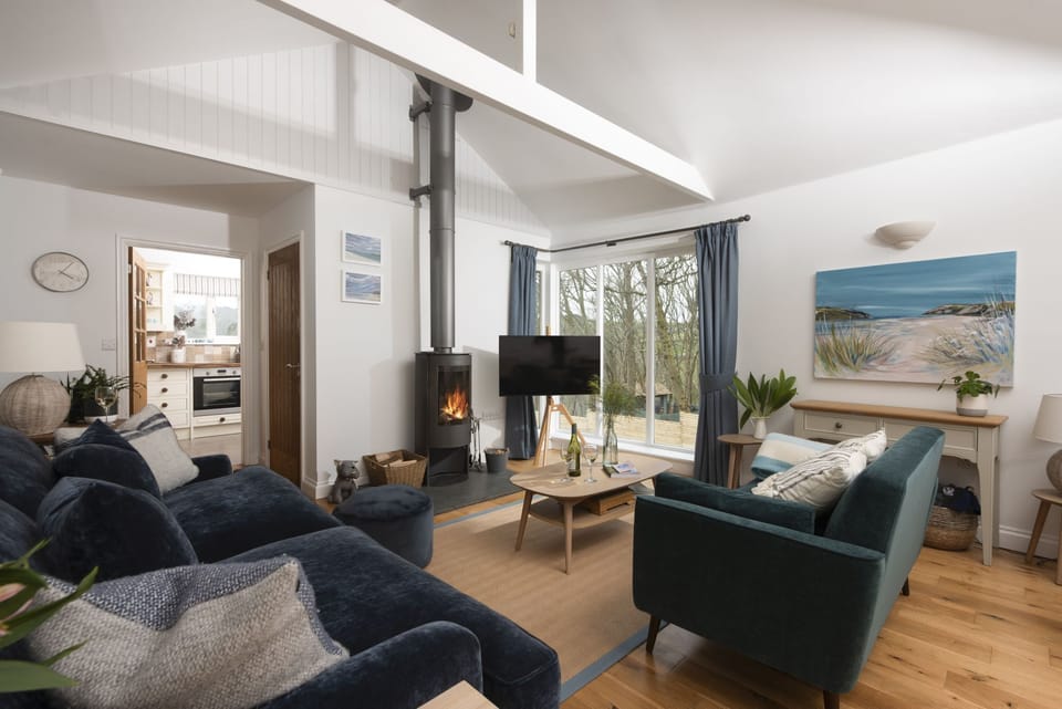 Exposed beams in living room leading to commission - Lobbs Cottage