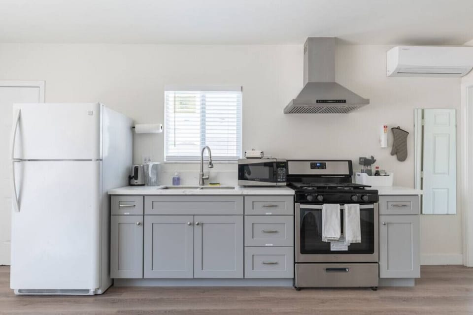 Cook up a storm in our spacious kitchen, fully equipped with brand new gadgets and essential cooking tools.