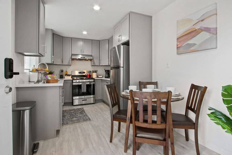 Savor your home-cooked meals at our dining table, which can accommodate up to four guests.