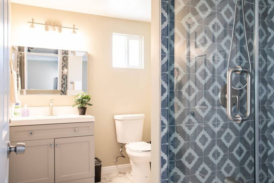 Indulge in a spa-like experience in our well-appointed bathroom with a luxurious walk-in shower.