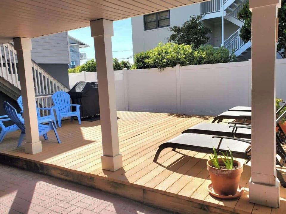 View from front door, beach is 10 steps away! New BBQ grill and lounge chairs just added!