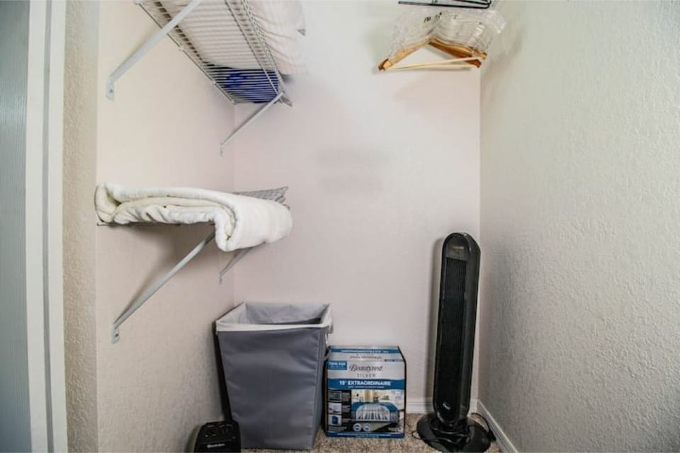 Master Bedroom Closet. Air Mattress. Laundry Basket.