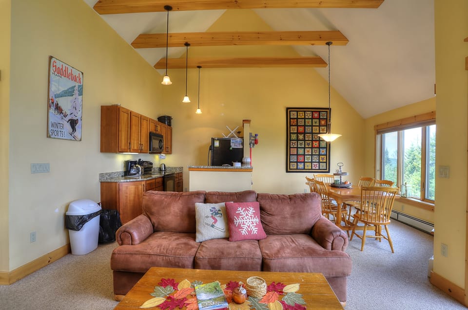 Living area with view of kitchen and dining area