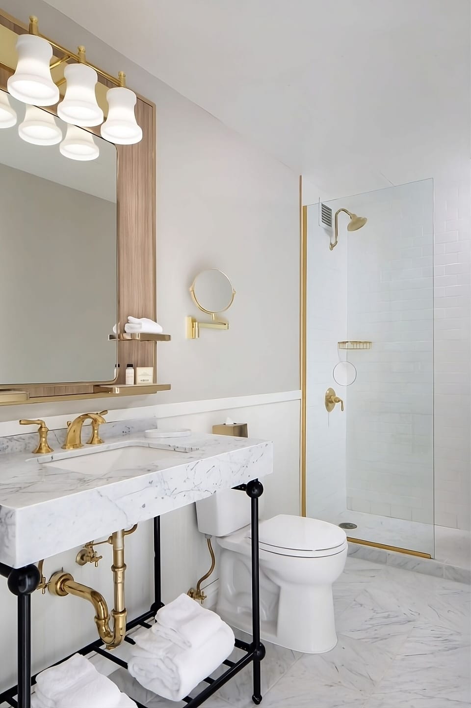 Indulge in marble finishes and a spa-like, airy shower.