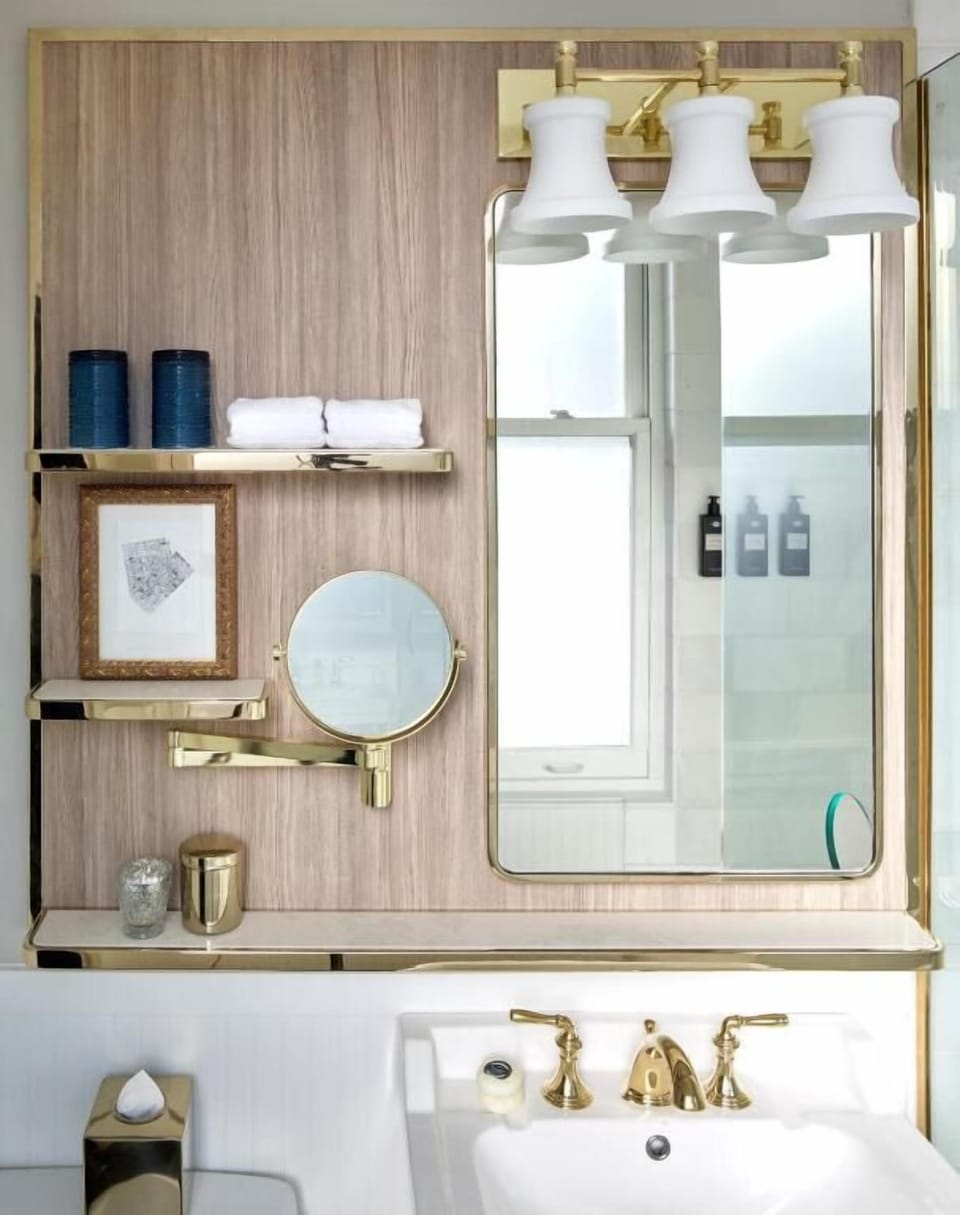 Get ready with bright vanity lighting and neatly styled essentials.