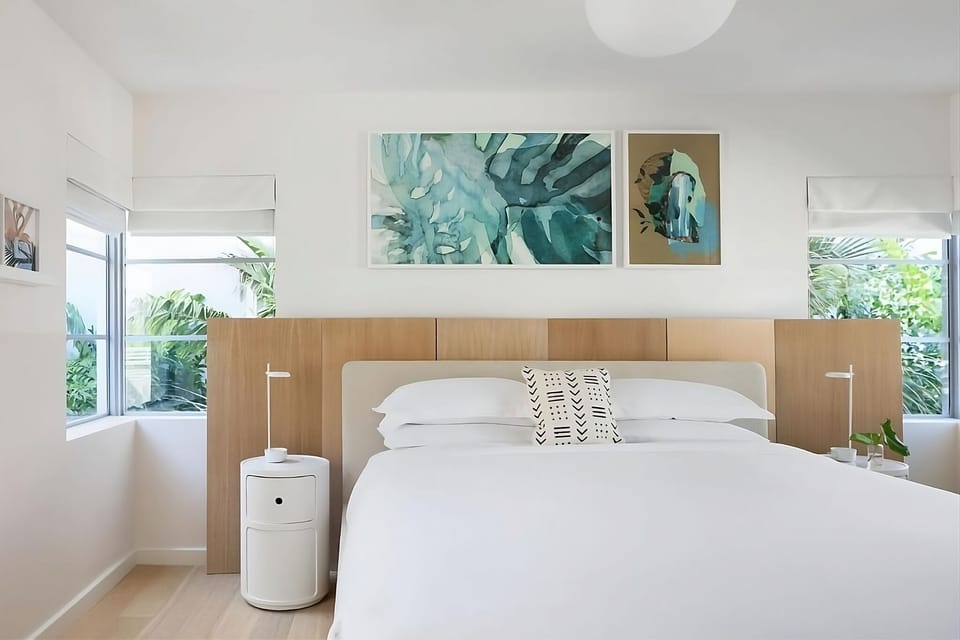 Wake up to lush views in a sunlit king retreat.