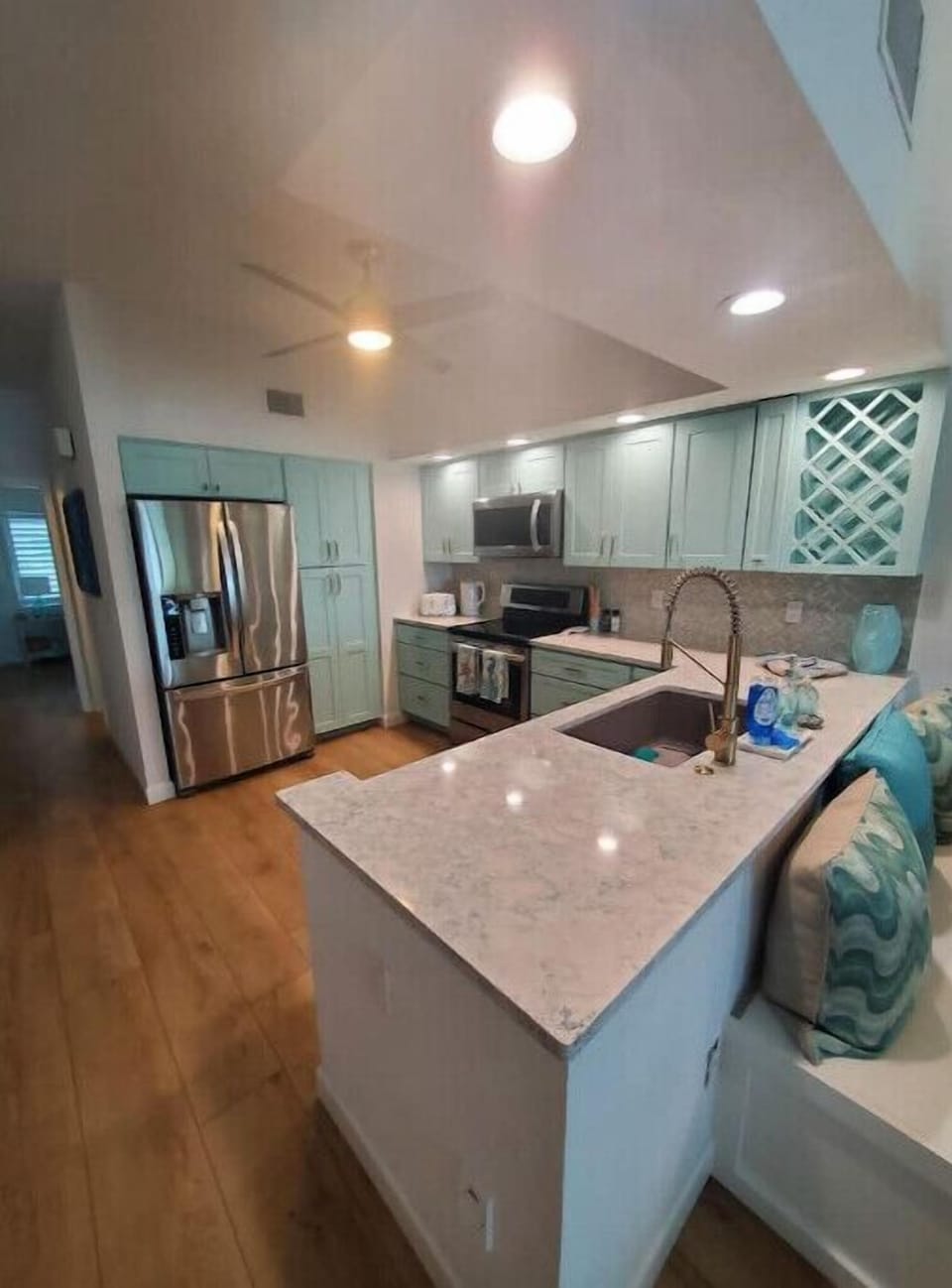 Beautiful quartz countertops, tile backsplash, spacious pantry. All LVP floor.