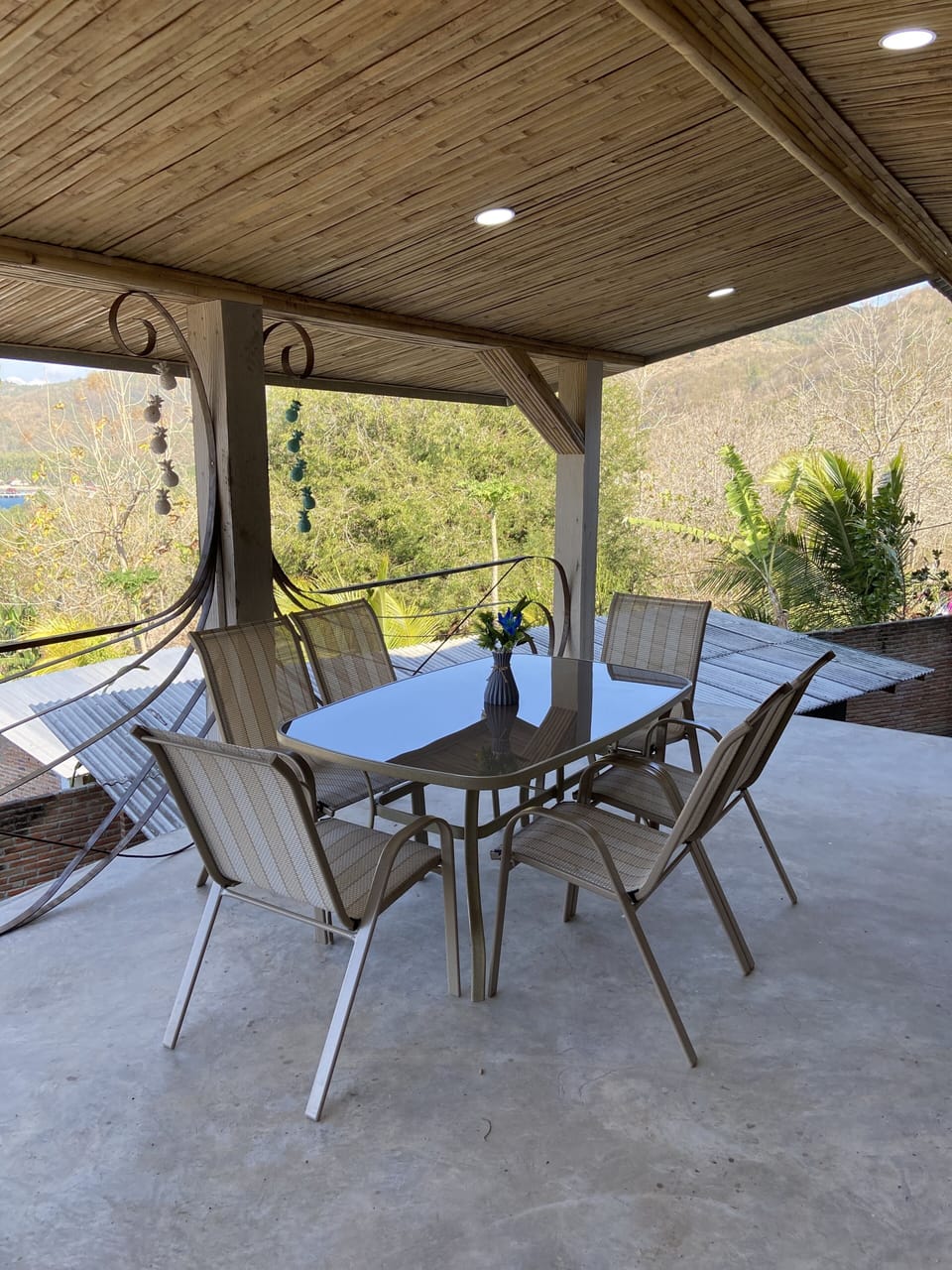 Outdoor patio off the main living space that seats 6. 