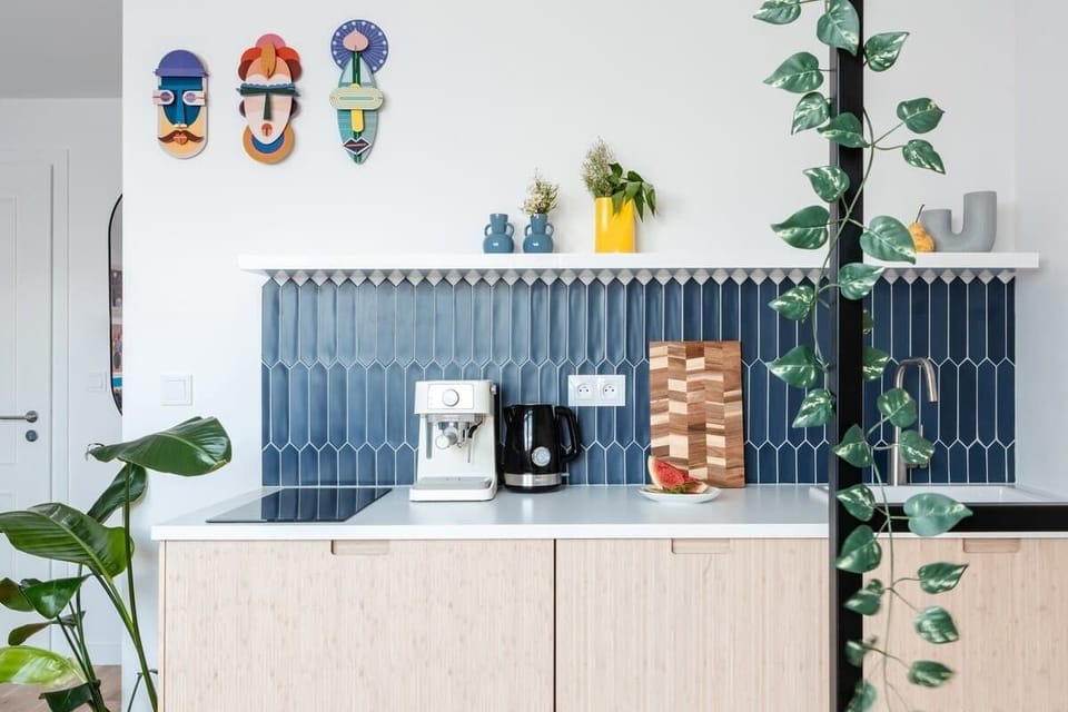 Fully equipped kitchen is located in lower level of the apartment