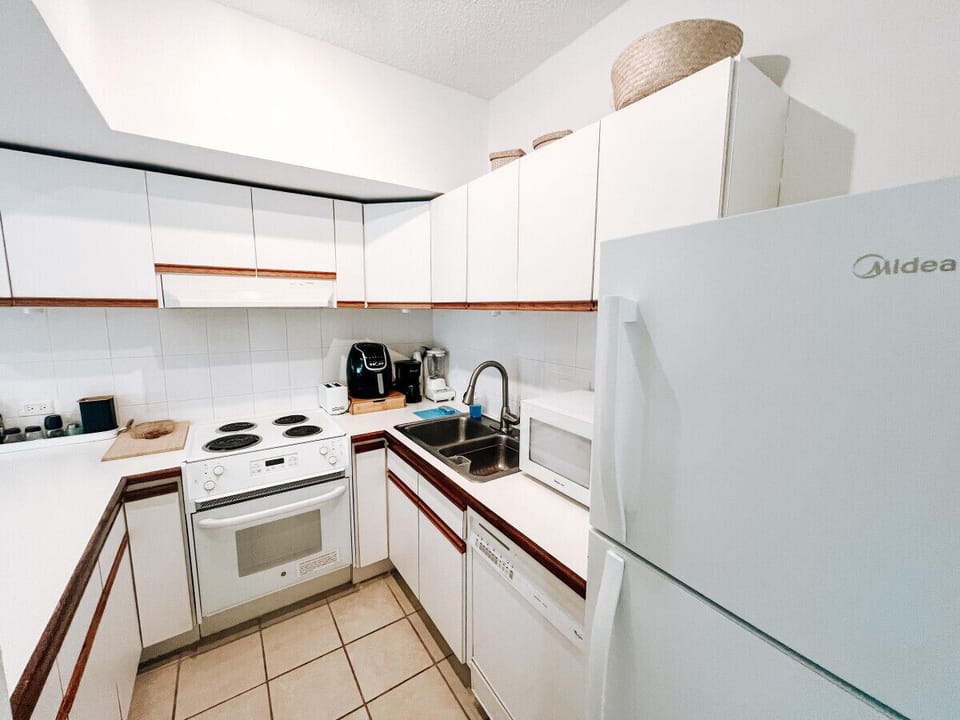 Modern Kitchen with Sleek Appliances and Ample Space