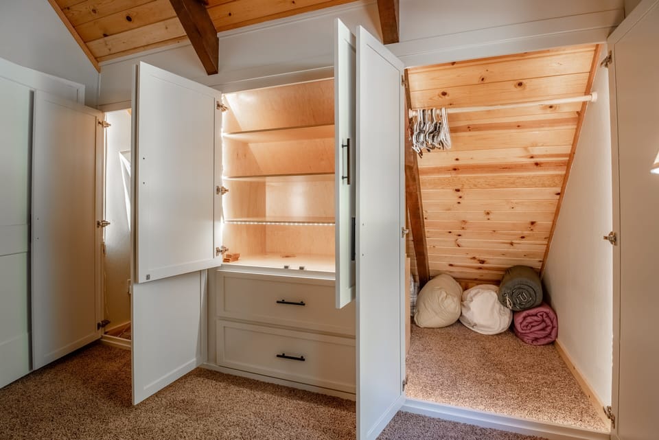 Built in closet space in primary bedroom upstairs