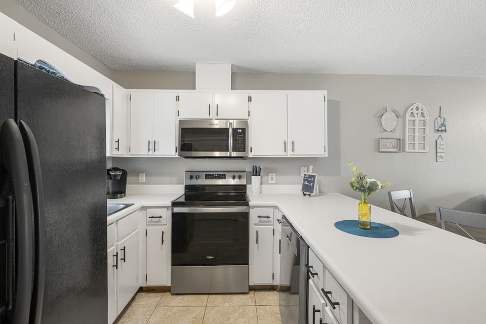 Modern kitchen with stainless steel appliances and ample counter space