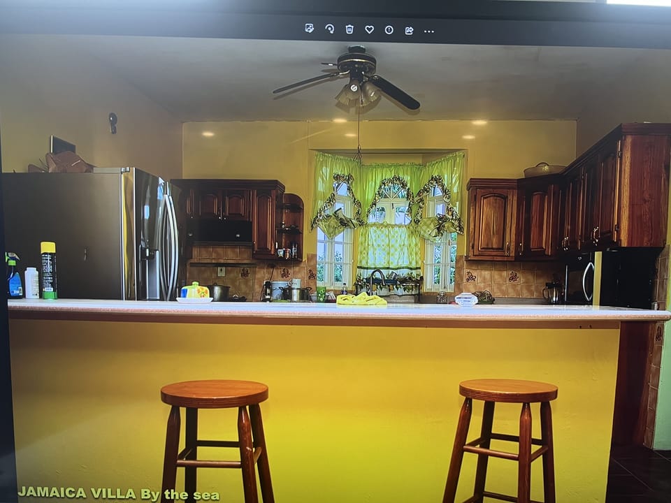 Inside the kitchen. There’s also a bar.