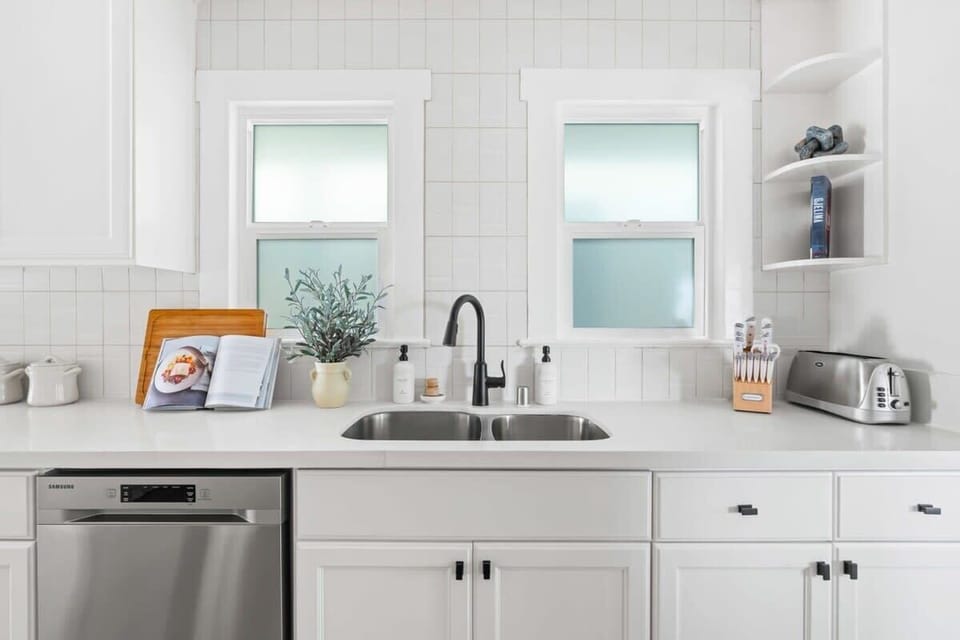 This home's beautiful kitchen is fully equipped with everything needed to cook a delicious meal for friends and family.