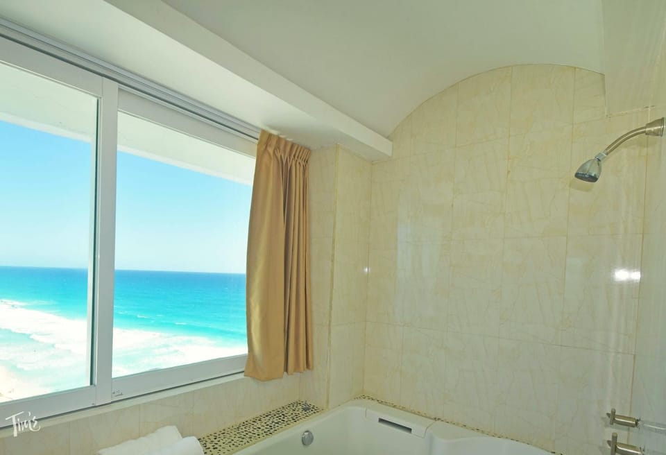 Penthouse 1 of 3: Master Bathroom Shower.  We provide Large &amp; Soft 100% Cotton Towels in Every Bathroom with a Shower.  We also Provide 8 Large Beach Towels for the unit.