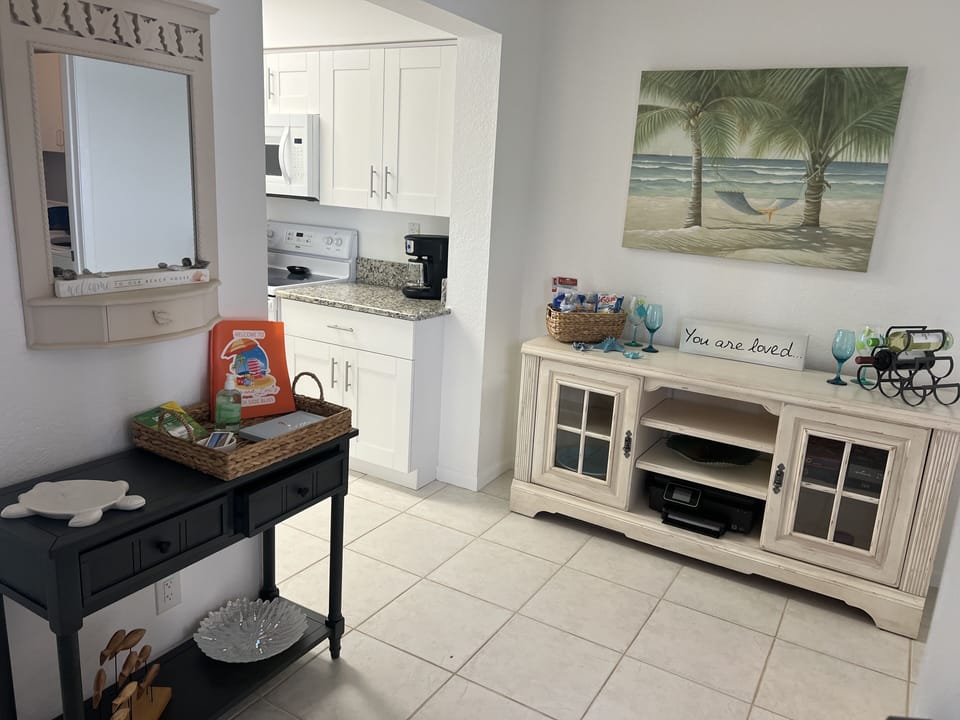 Welcome area with condo information, restaurant menus and complimentary snacks
