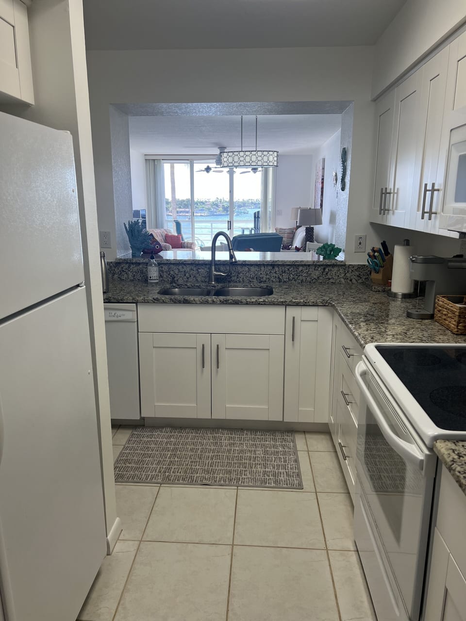 Fully stocked kitchen with plenty of basic supplies to begin your stay